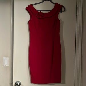 Red Calvin Klein dress with scoop neck and flower detail